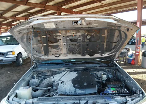 2015 Toyota Tacoma Base V6 z USA, uszkodzony, nr VIN 3TMLU4ENXFM194684